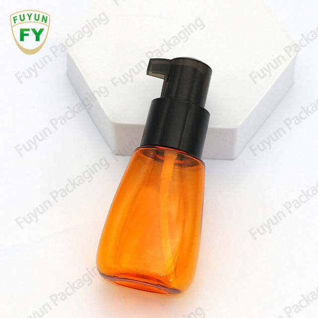 80ml 2,5oz Chai đựng dầu tóc bằng nhựa PET rỗng có bơm kem dưỡng da màu cam